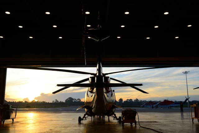 2 pilots in a helicopter cockpit
